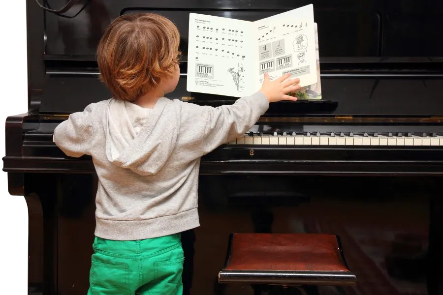 Children learning piano